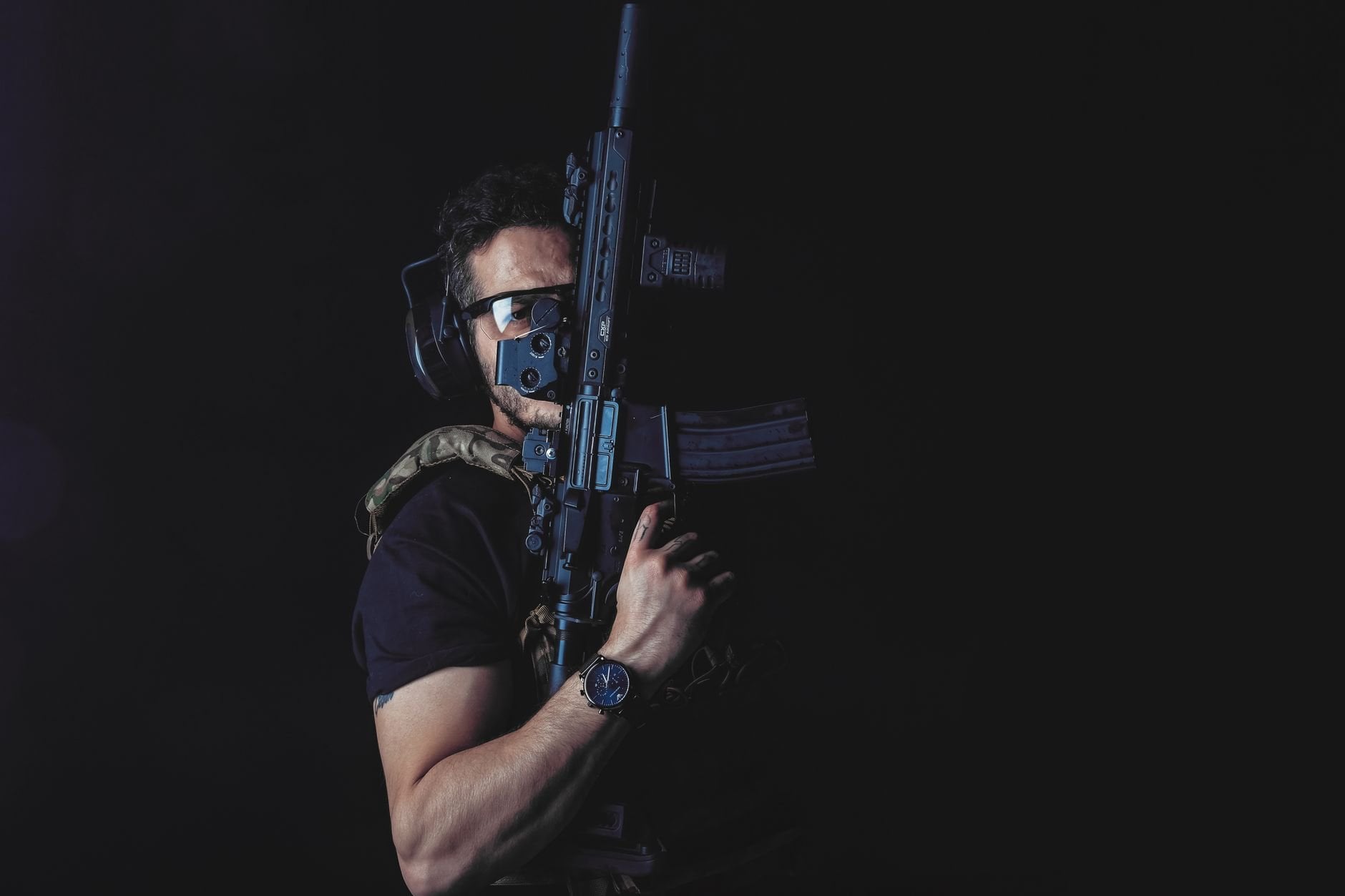 Tactical security professional in dark environment